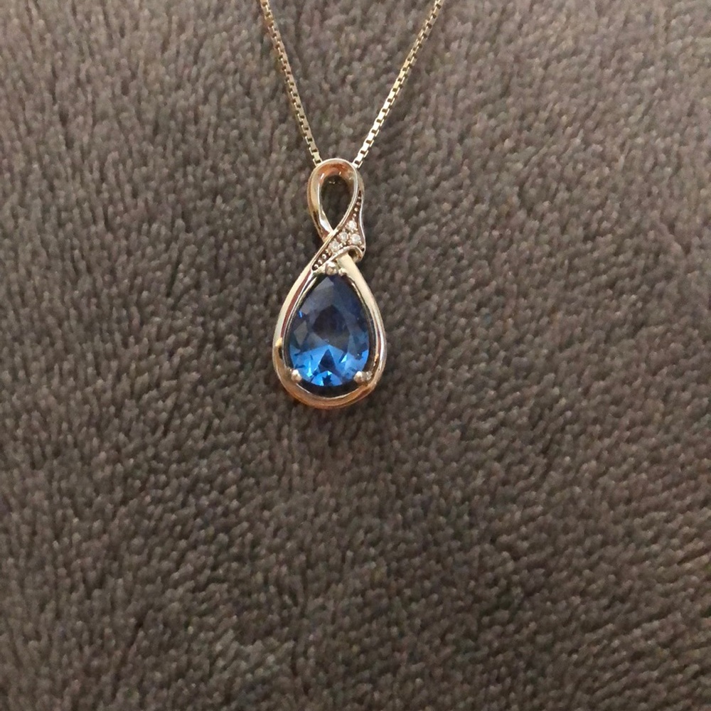Beautiful blue stone necklace with diamond studs